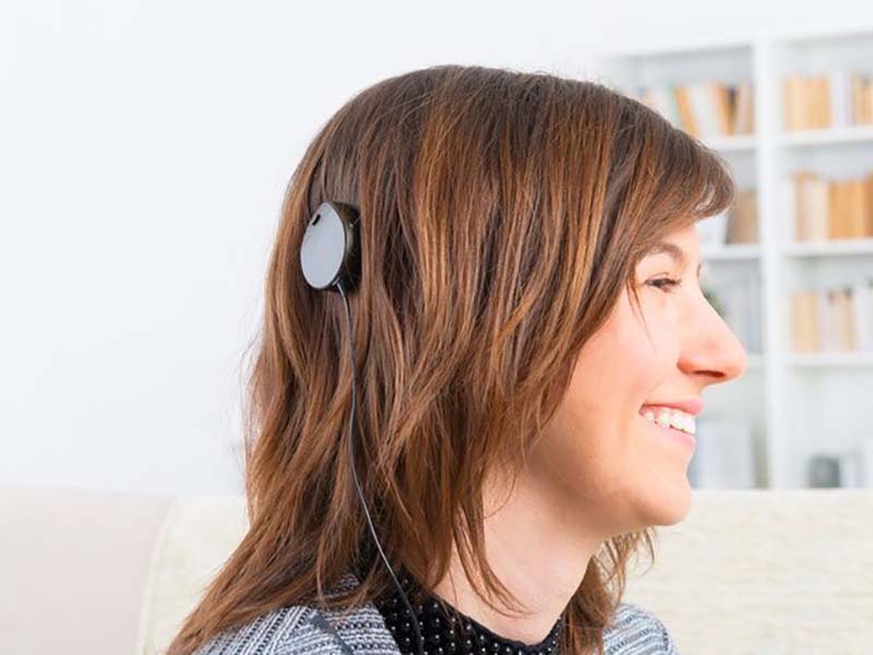 A women with a cochlear implant